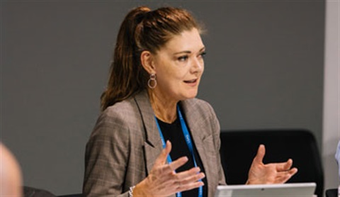 Alison_Smith_talking_at_table_1.jpg