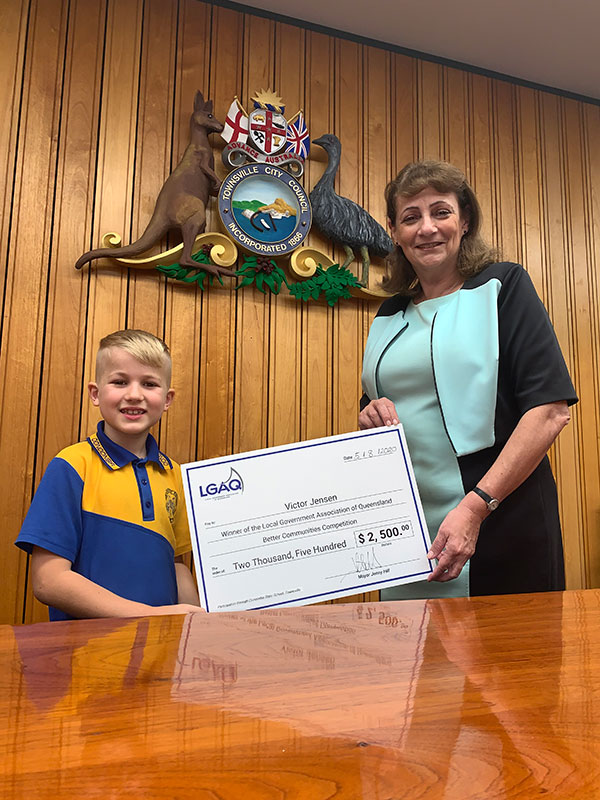  The primary school winner of the LGAQ Better Communities Competition Victor Jensen with Townsville City Council Mayor Jenny Hill